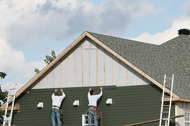 Professional Siding Installation technician working in Hurlock, MD